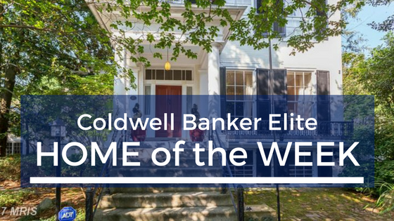 White house with text overtop saying "Coldwell Banker Elite Home of the Week"